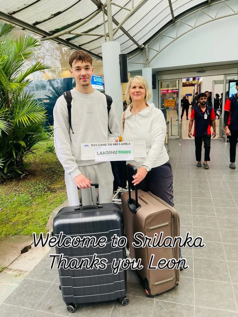 Private driver meeting international guest at the Sri Lanka airport arrivals area.
