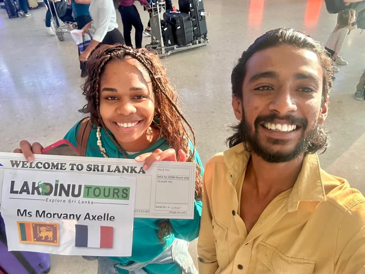 Private driver welcoming international guests at Bandaranaike International Airport.