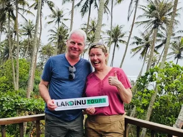 Tourists relaxing on a beach resort balcony during their Sri Lanka tour.