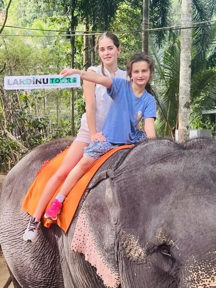 Family with kids experiencing wildlife up close during a Sri Lanka tour.
