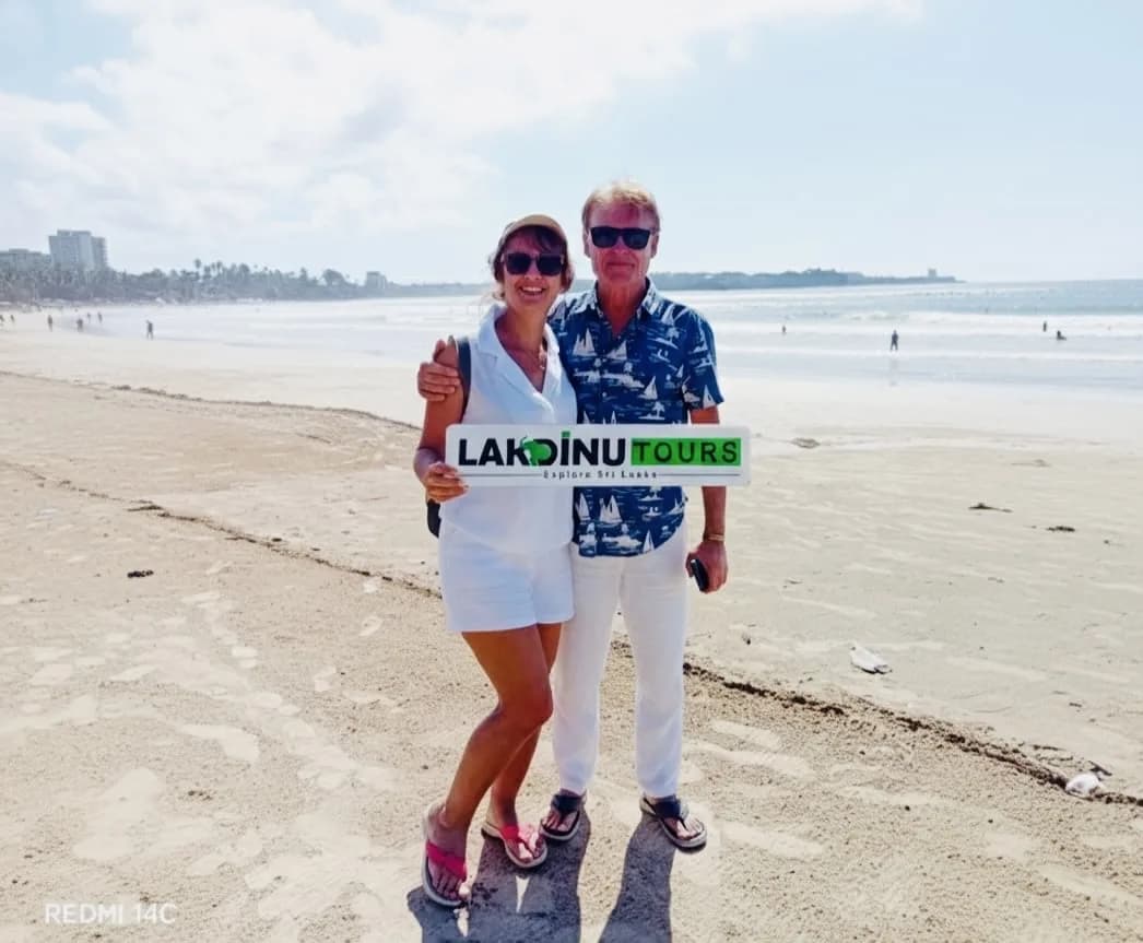 Couple enjoying Sri Lanka tropical coastlines on a private driver vacation.